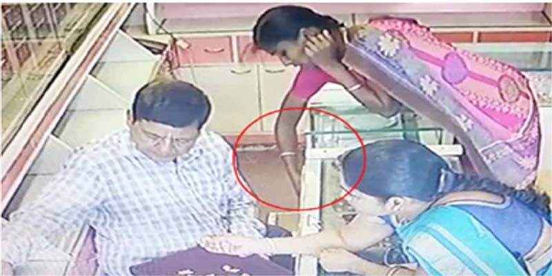 கடை உரிமையாளரின் கவனத்தை திசைத்திருப்பி நகை திருட்டு